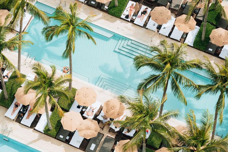Where Art Deco Shadows Fall Across Infinity Pools