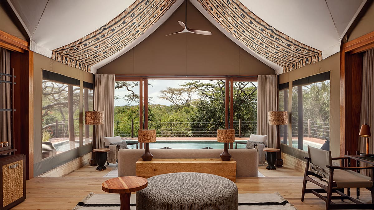 Where Rhinos Outnumber Guests and Mountains Frame the Horizon