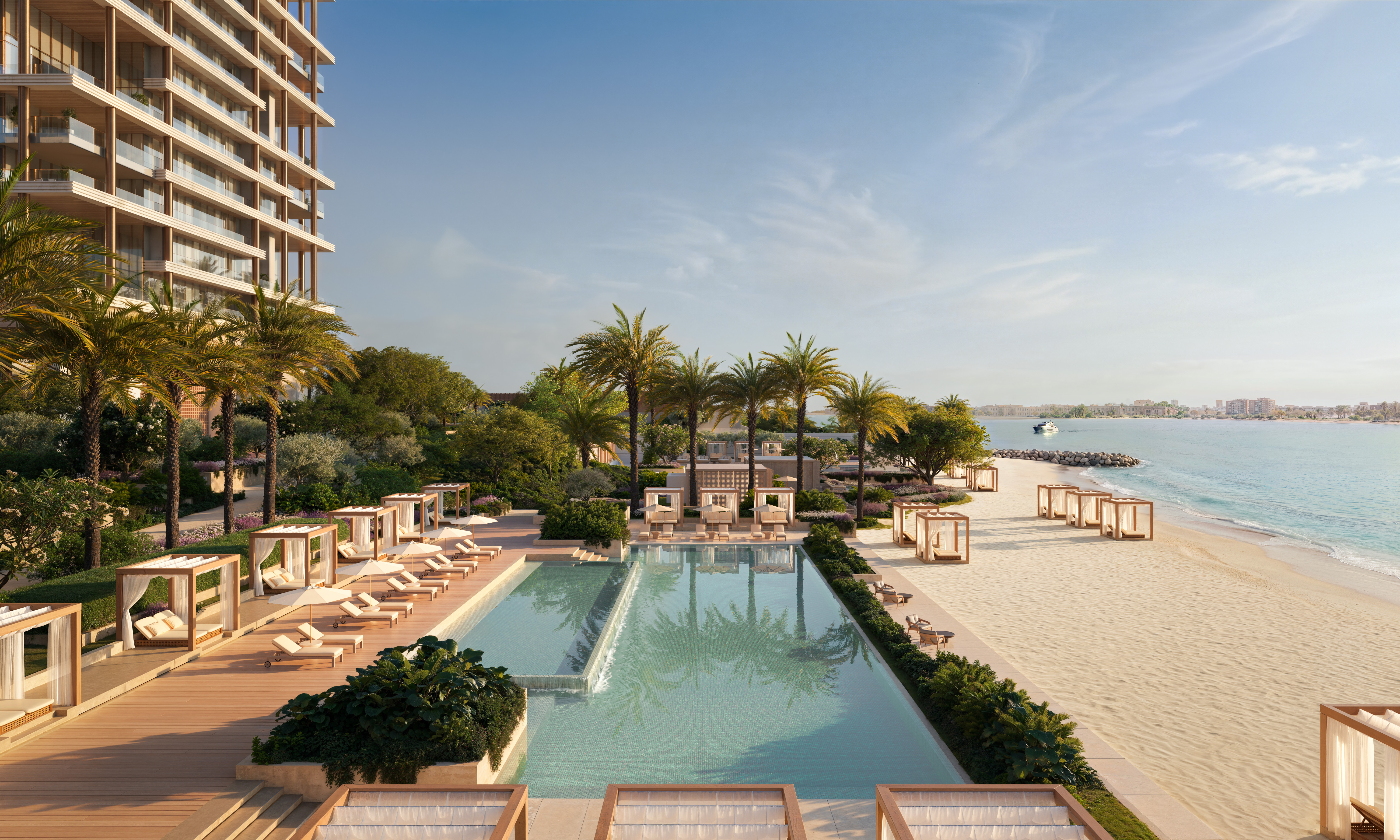 The hotel pool and beachfront. Image: Janu / Petrie PR.