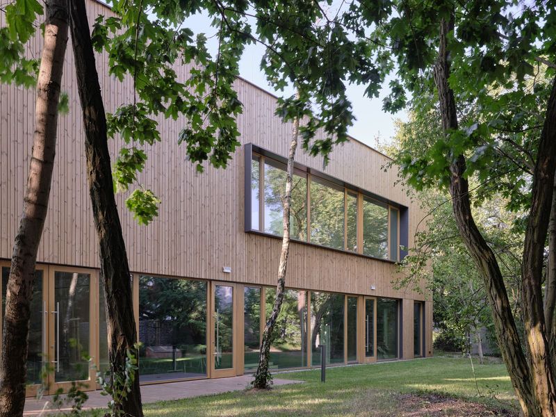 Building Community with Timber and Light in Warsaw's Choszczówka