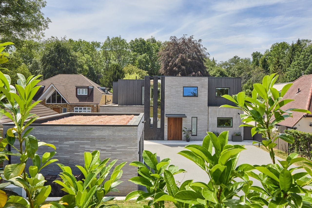 The Courtyard as Climate Strategy: Rethinking Passive House Typology in the Home Counties