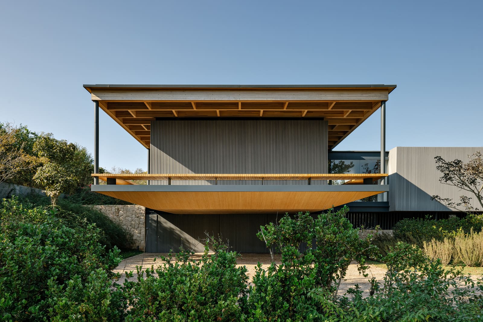 Navigating the Slope: How One Brazilian House Reads the Forest Floor