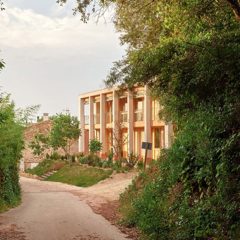 How Three Parallel Wings and Regional Craft Shaped a Catalan Home
