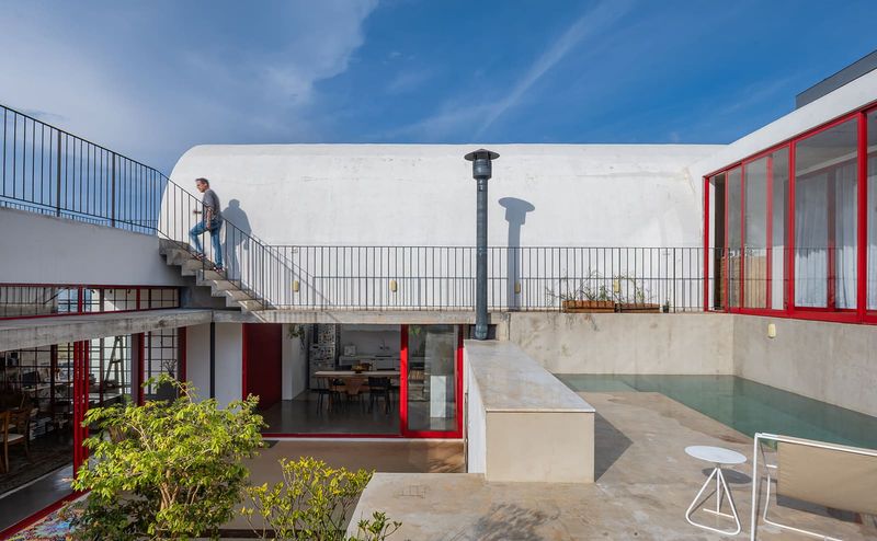 Three Volumes and a Courtyard: Rethinking Domesticity on a Steep Brazilian Slope