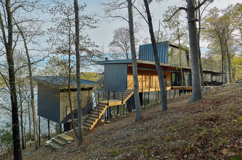 Modus Studio’s Grist Mill Cabin Blends Deconstructed Lakehouse Design With The Natural Hillside Of Beaver Lake