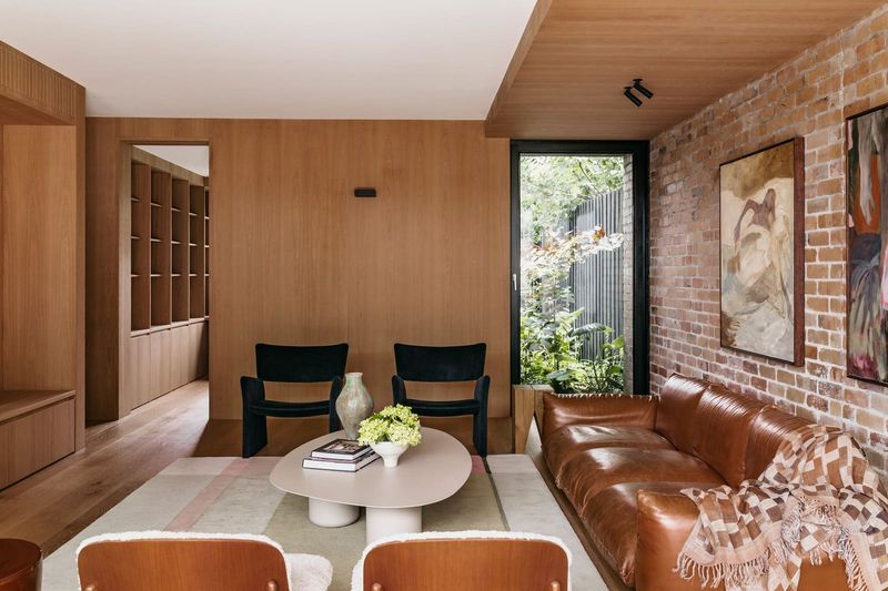 When a House Holds Two Moods: Restraint Outside, Warmth Within
