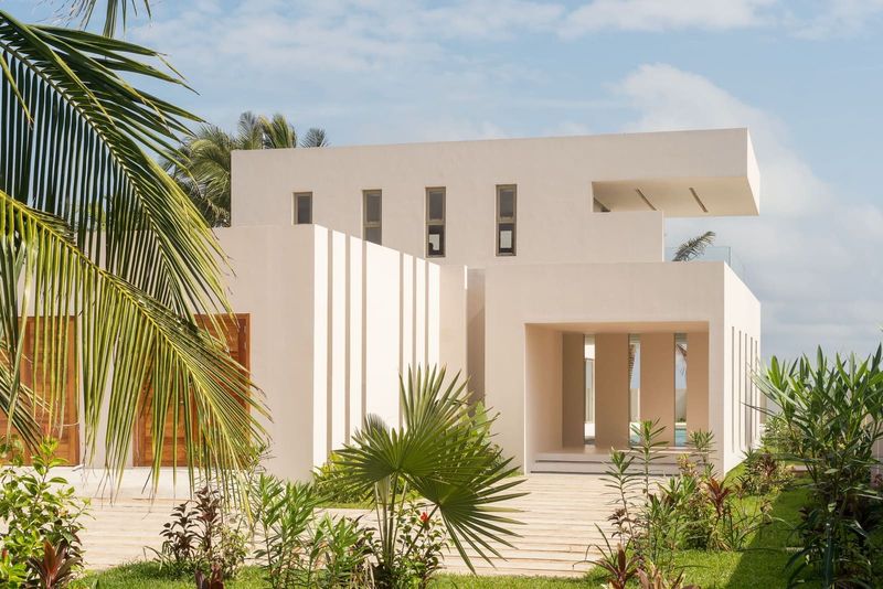 When White Sand Demands White Walls: A Lagoon House in Nigeria